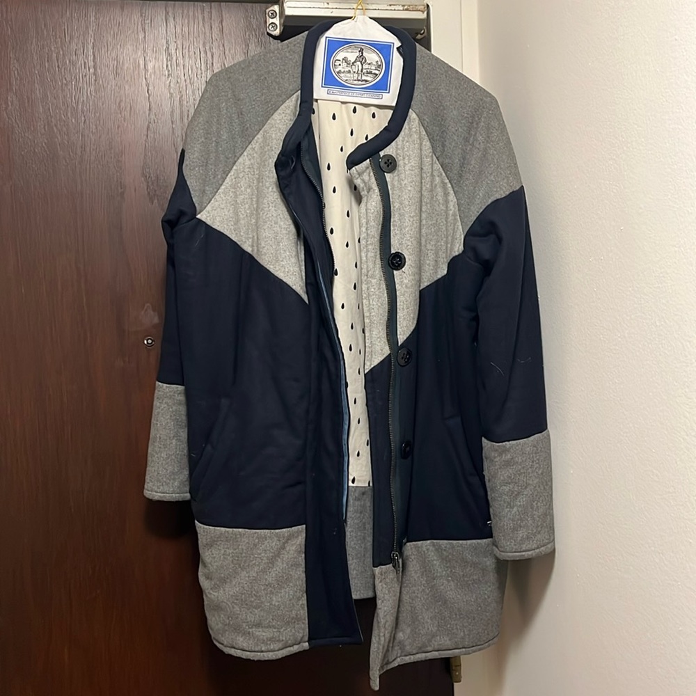 Warm, Comfortable and Gorgeous. Predominately wool with some polyester.